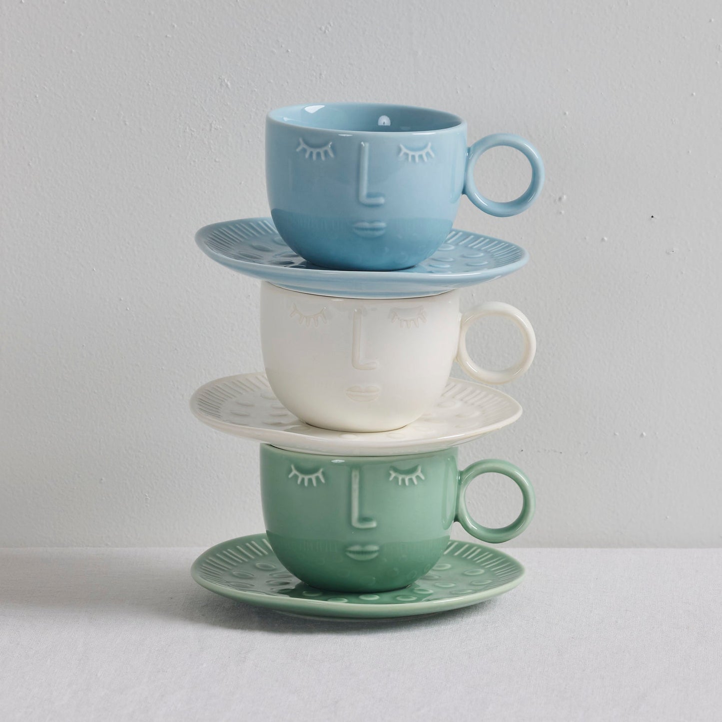 Tasse et soucoupe Visages - Bleu clair