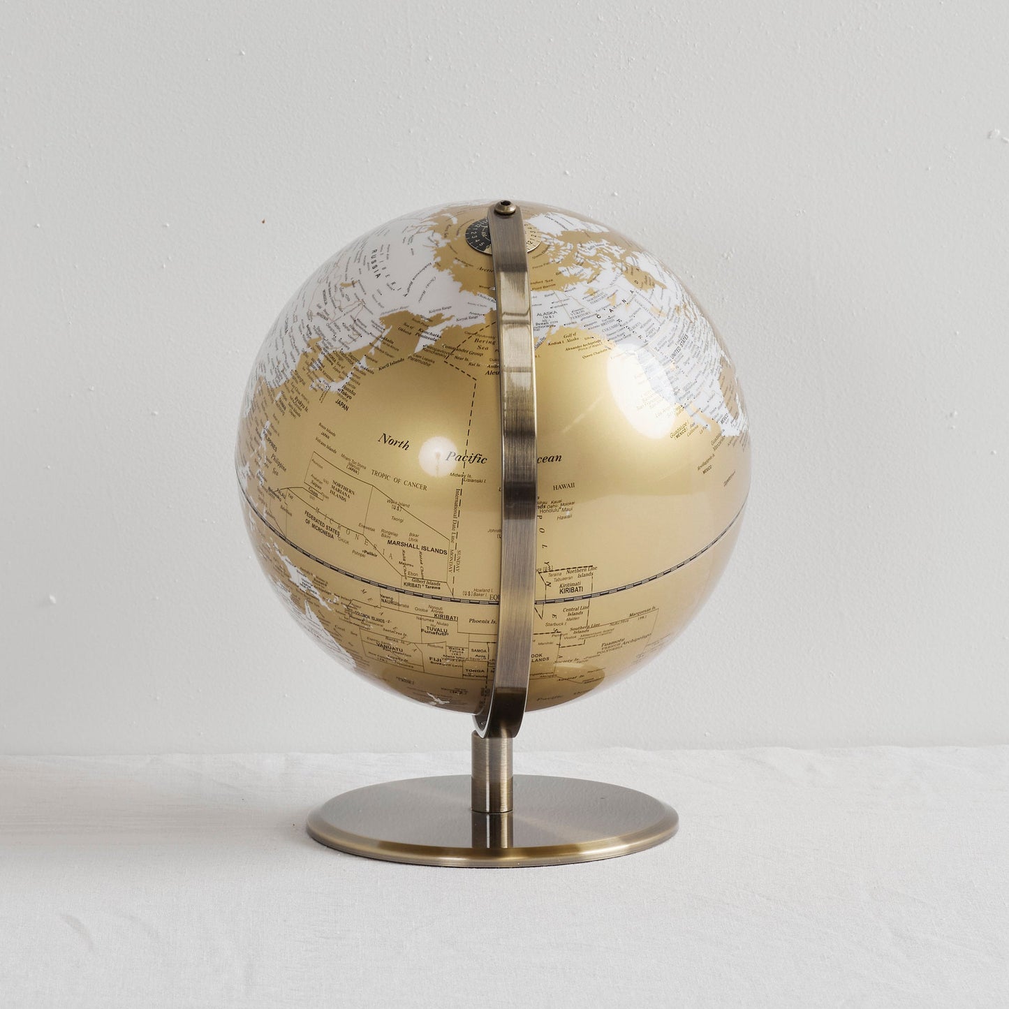 Globe tournant - Or/Crème