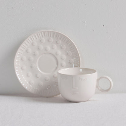 Tasse et soucoupe Faces - Blanches