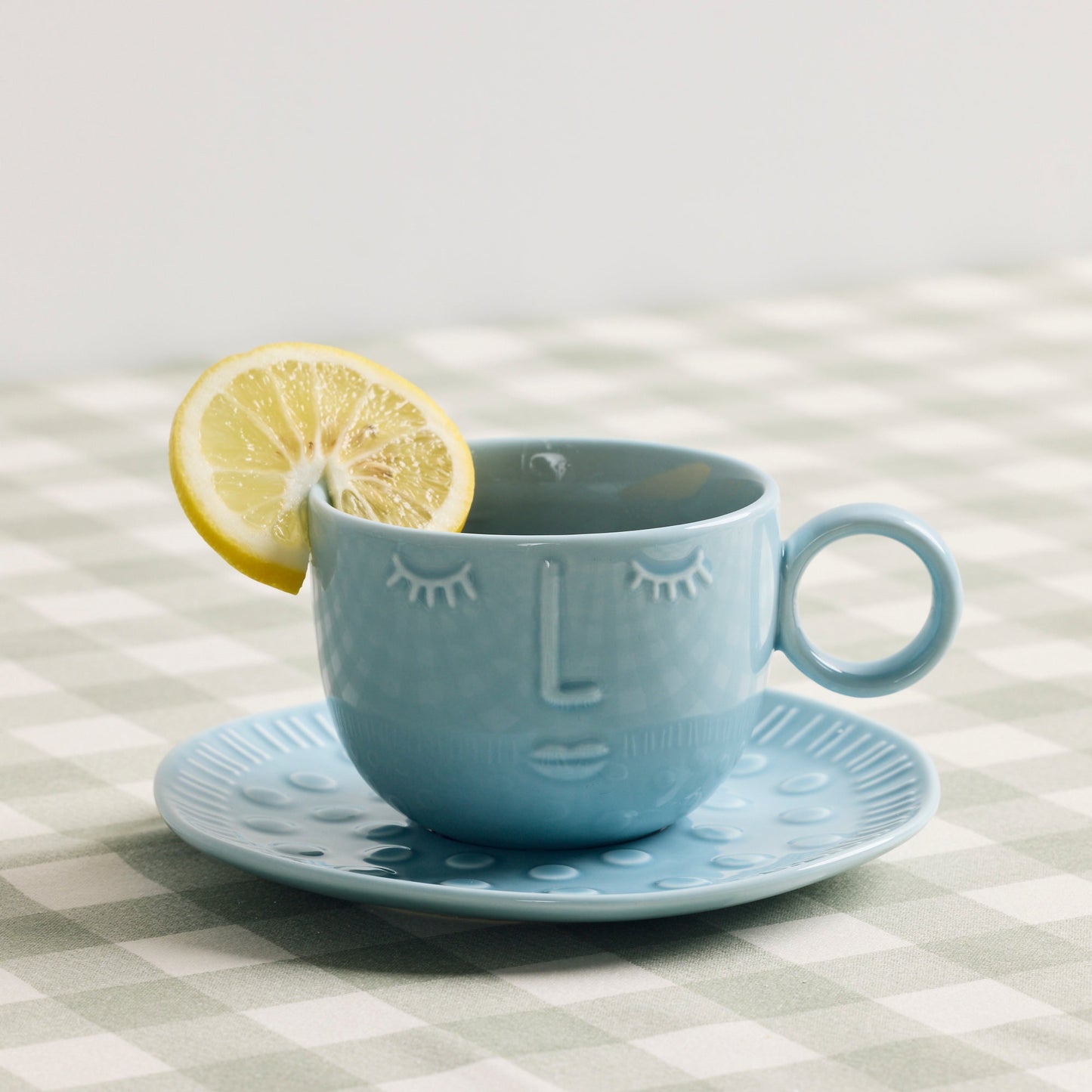 Tasse et soucoupe Visages - Bleu clair
