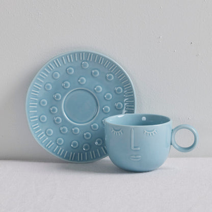 Tasse et soucoupe Visages - Bleu clair